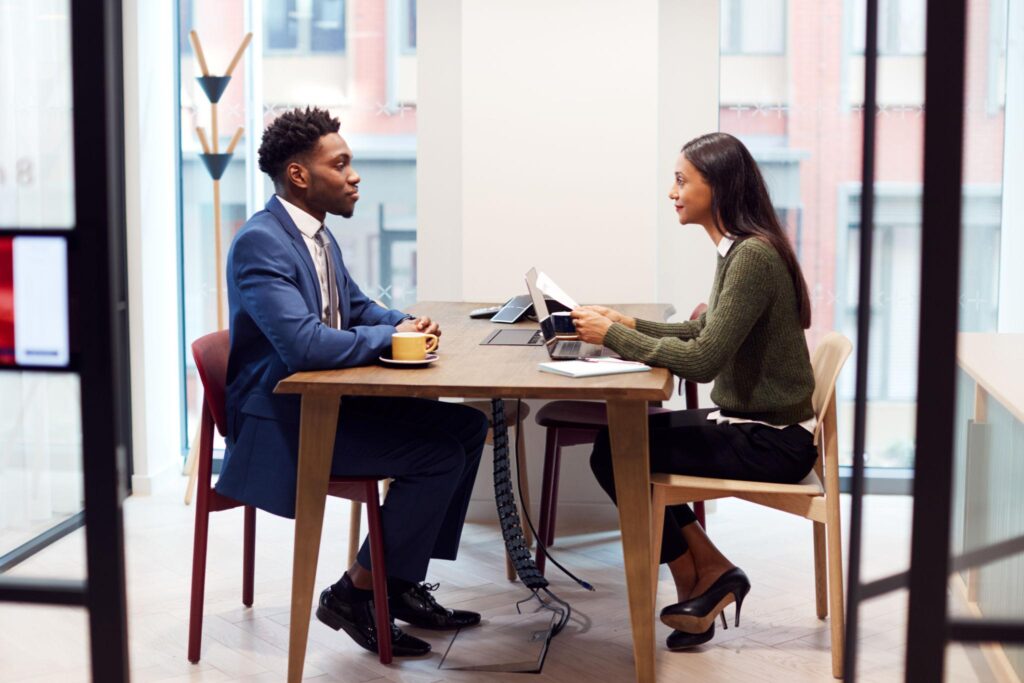 Employer interviewing a candidate as part of the process to hire staff fast in Luton