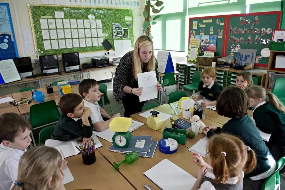 Teaching assistants supporting pupils in Luton primary and secondary schools